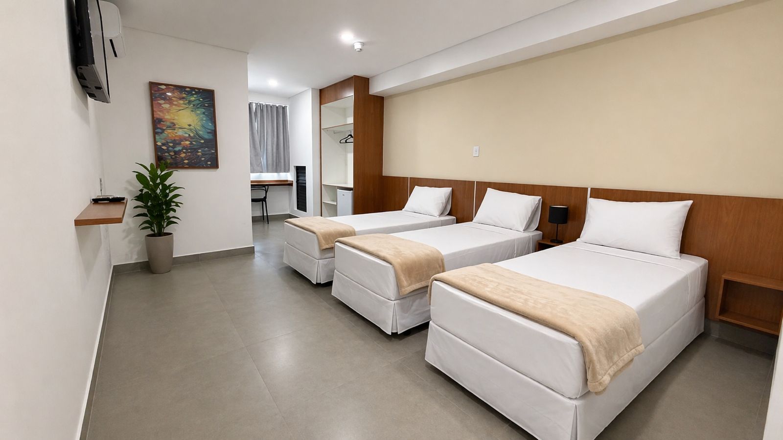 Acomodação Tripla do Smart Hotel